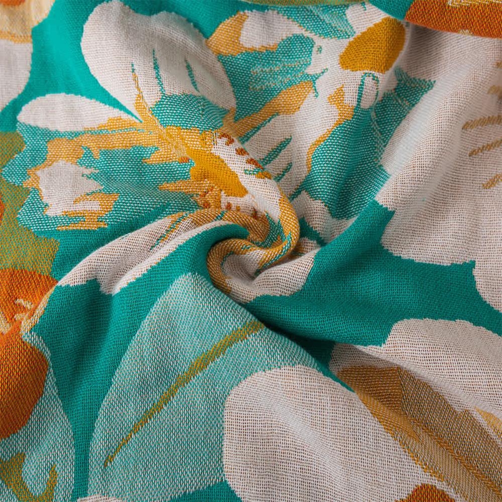 Floral throw blanket with white and orange flower design on teal background, lightweight decorative sofa and bed cover