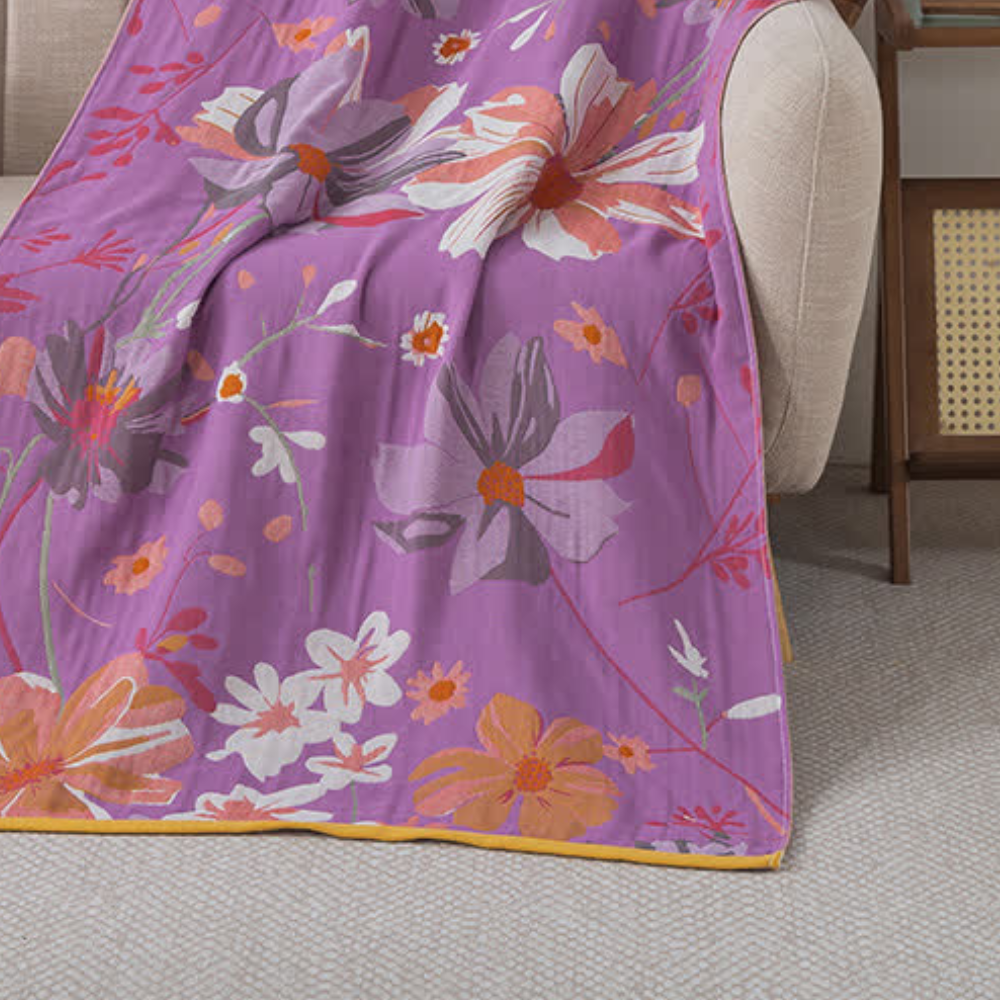 Purple floral throw blanket with large colorful flower pattern, lightweight decorative sofa and bed cover