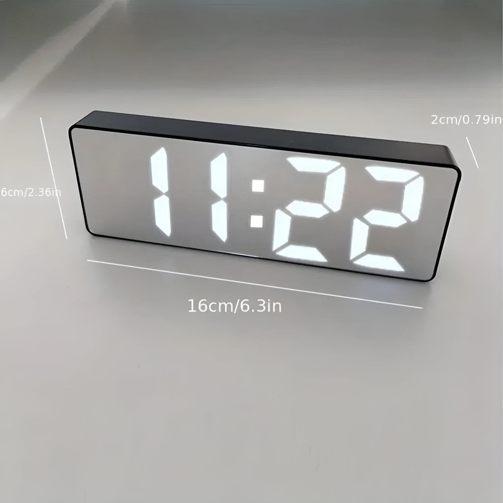 Modern LED digital alarm clock in black and white with large display, 12/24 hour format and night light feature