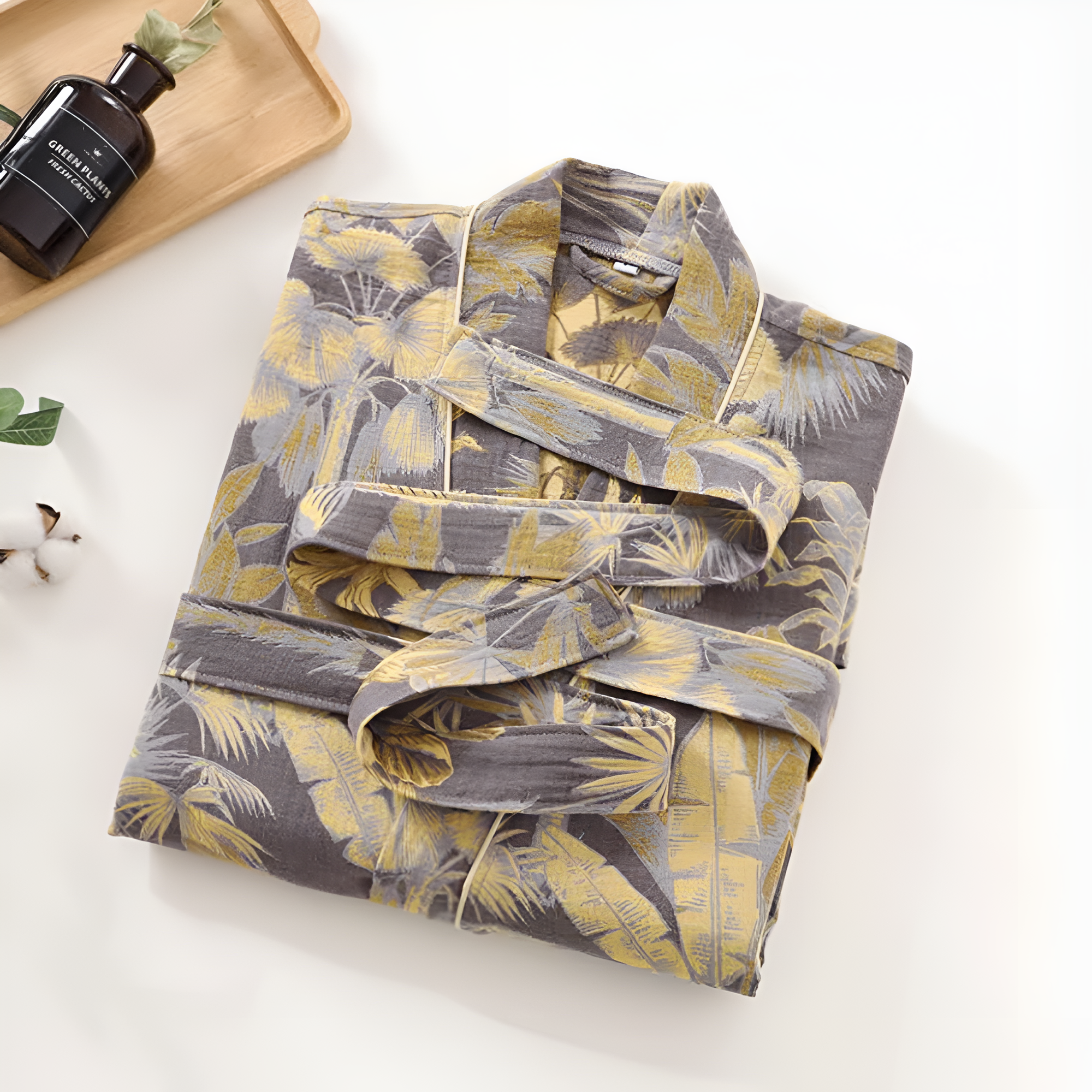 Lightweight cotton bathrobe with yellow tropical leaf print on gray background, belted loungewear with pockets
