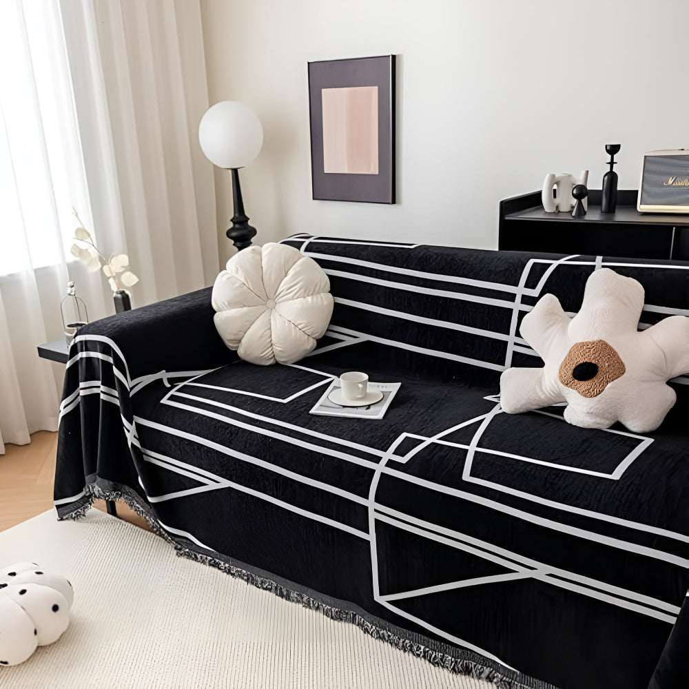 Black geometric sofa cover with white line pattern, modern couch throw for living room protection and home decor