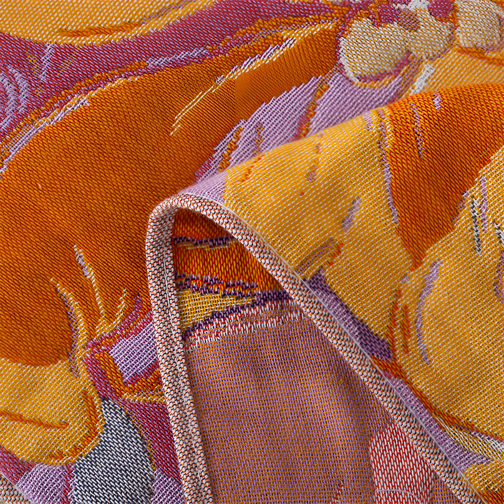 Soft throw blanket with large orange and purple floral print, decorative bed or sofa cover