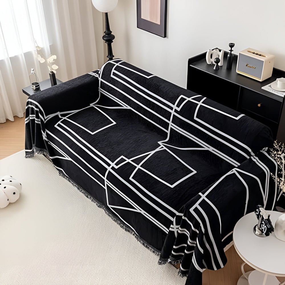 Black geometric sofa cover with white line pattern, modern couch throw for living room protection and home decor
