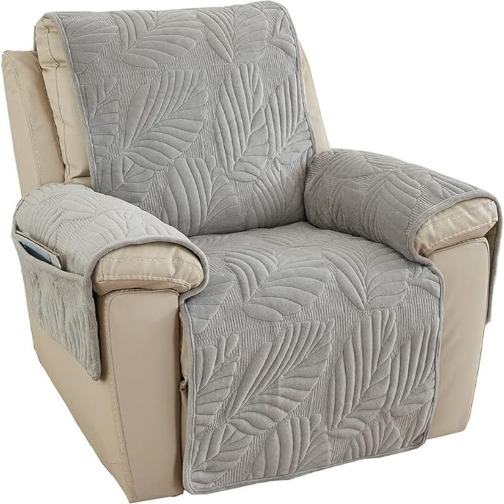 Grey quilted recliner chair cover with leaf pattern, soft padded armrest protectors and side storage pocket for living room furniture protection