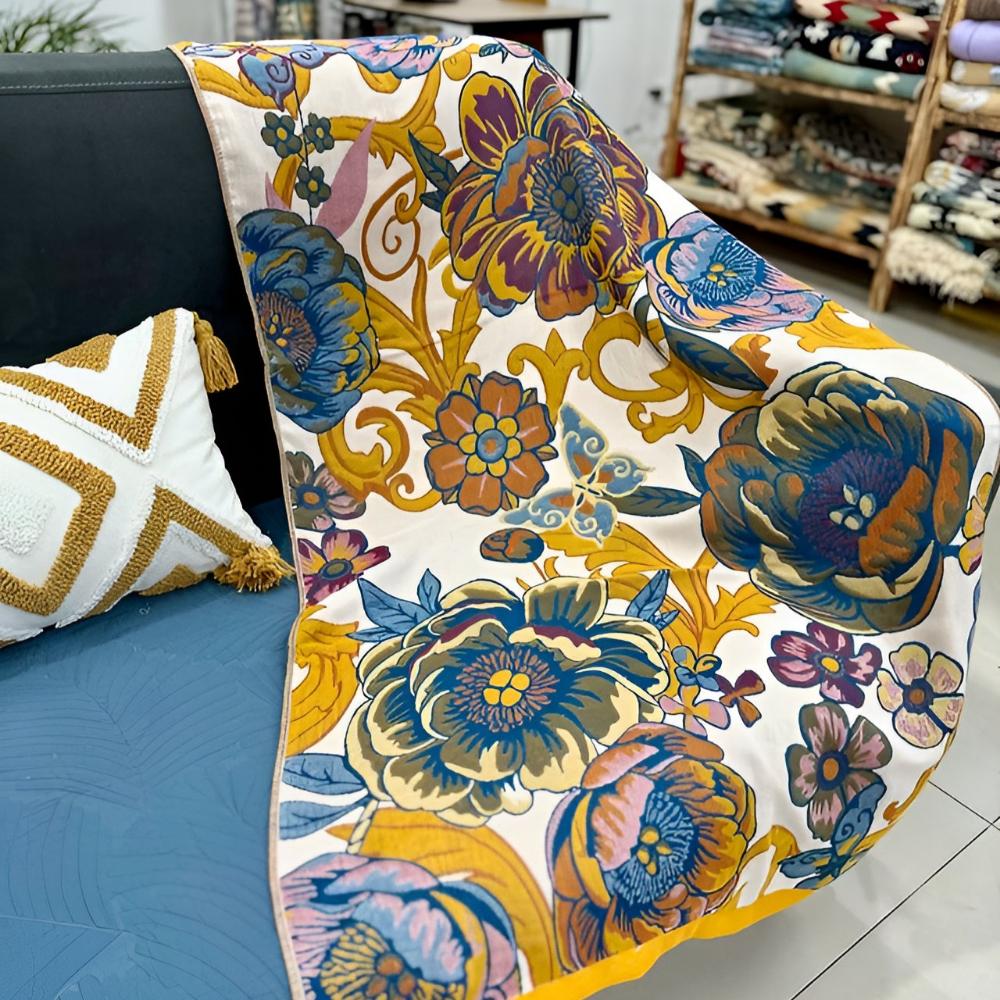 Floral throw blanket with cream background and bold blue yellow flower pattern, soft decorative sofa and bed cover