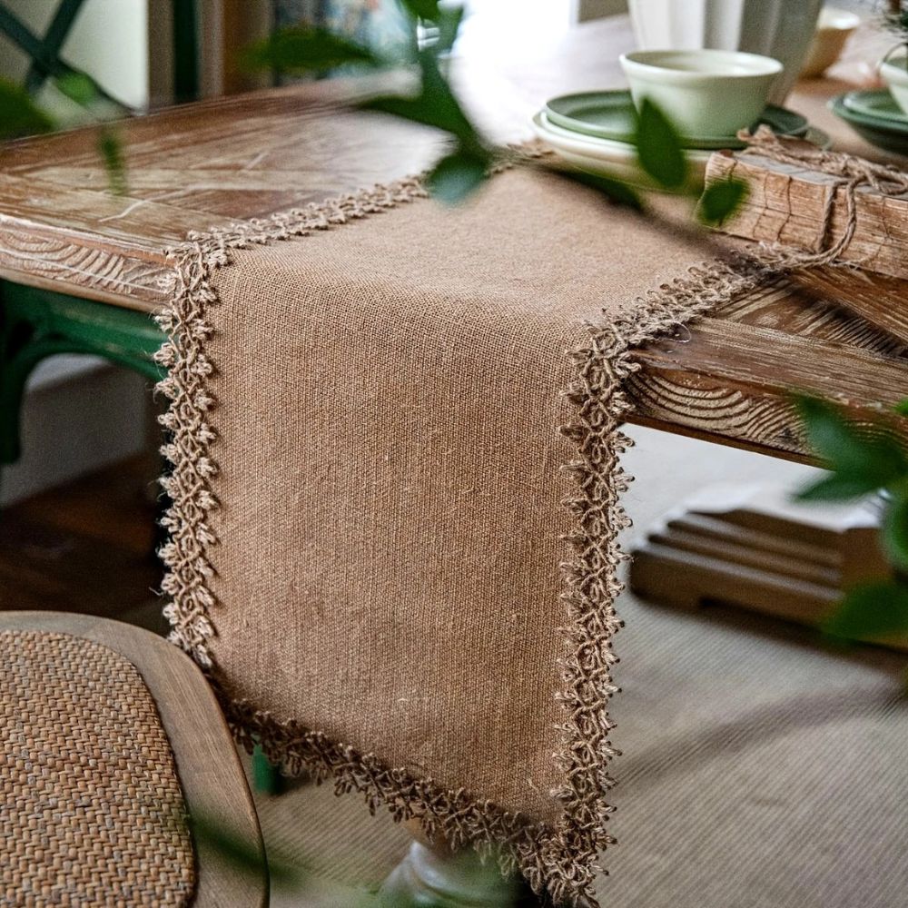 Rustic burlap table runner with crochet lace trim, farmhouse dining table decor for vintage and boho home styling