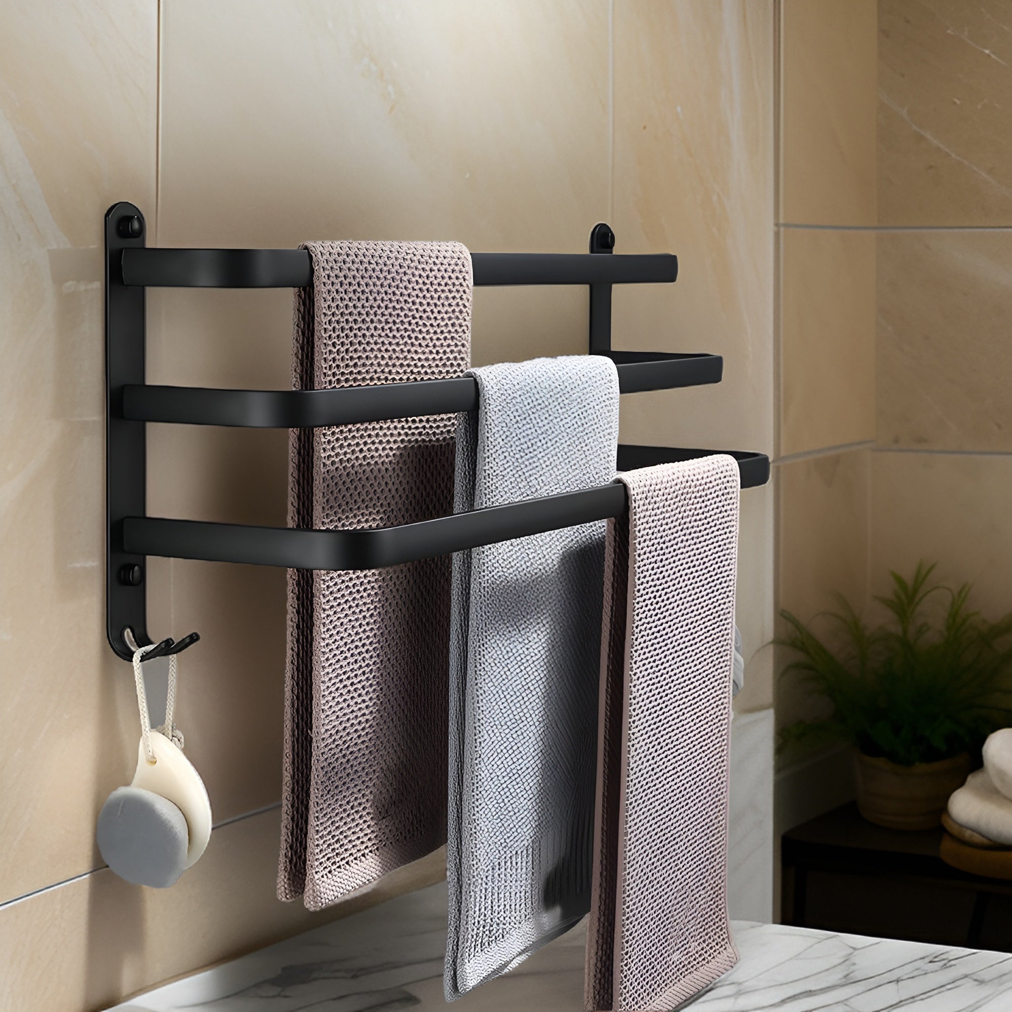 Wall-mounted black metal towel rack with multi-bar design, space-saving bathroom organizer for towels and linens