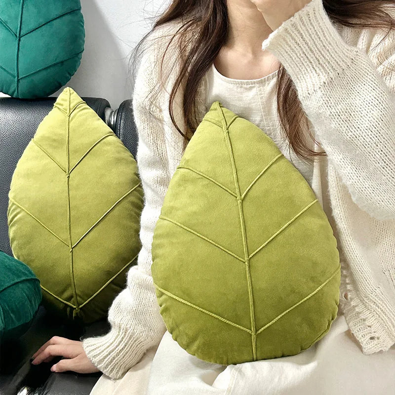 Leaf-shaped pillow – Plush material – Green design – Cozy living room accent