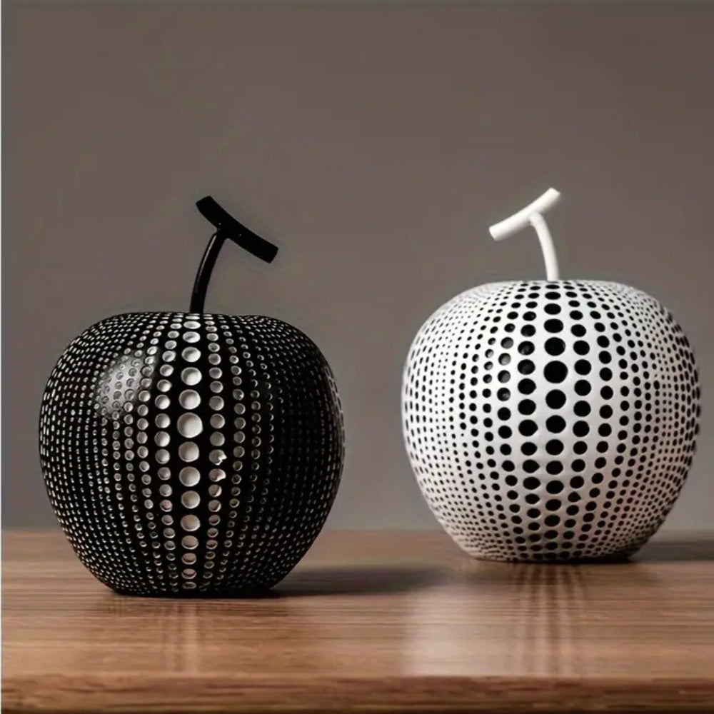 Modern black and white apple sculpture decor with polka dot design, contemporary resin ornaments for living room or office display