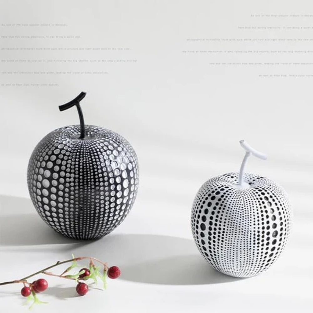 Modern black and white apple sculpture decor with polka dot design, contemporary resin ornaments for living room or office display