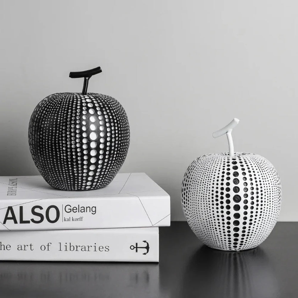 Modern black and white apple sculpture decor with polka dot design, contemporary resin ornaments for living room or office display