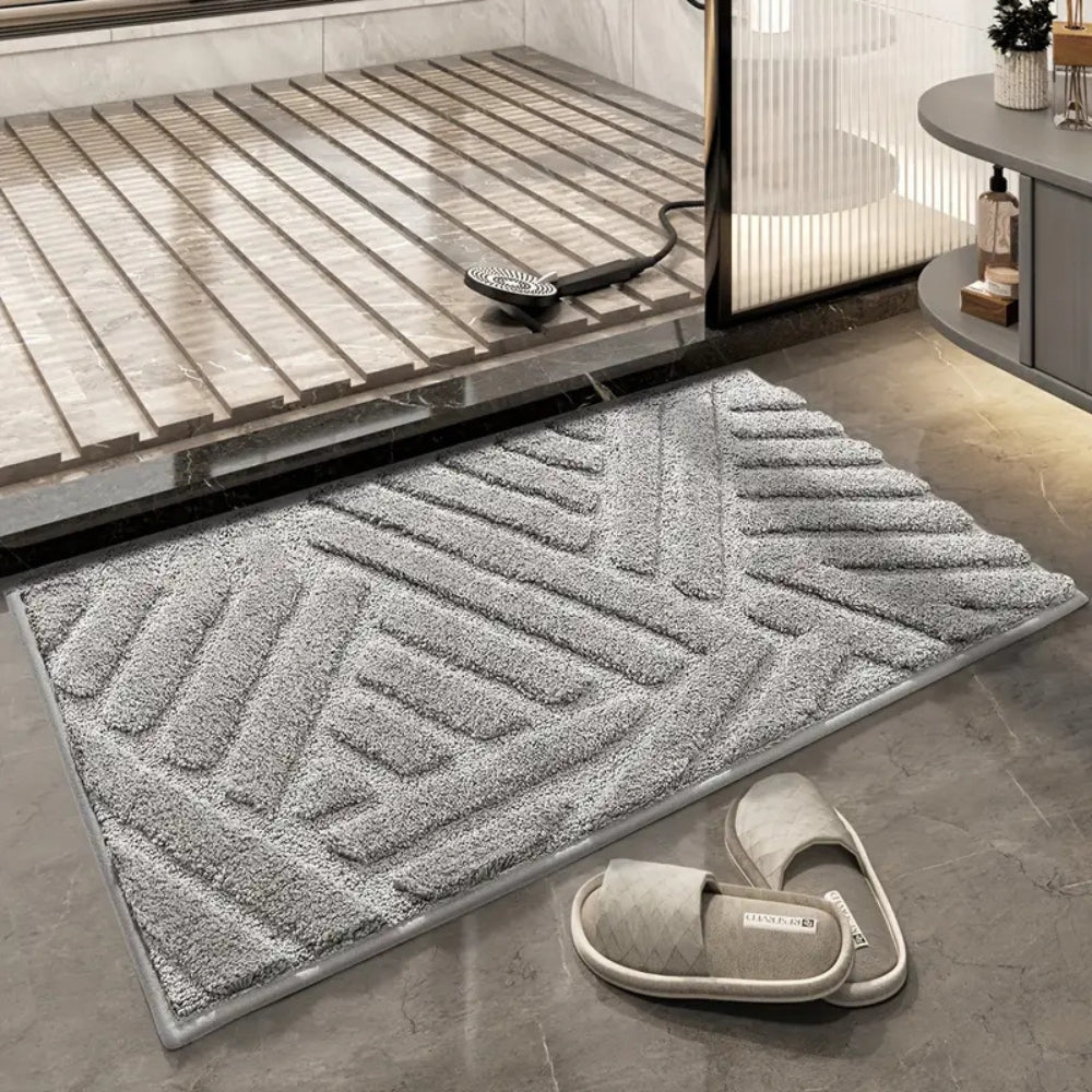 Anti-slip white bathroom rug with modern geometric embossed pattern, soft absorbent bath mat for bathroom and shower area