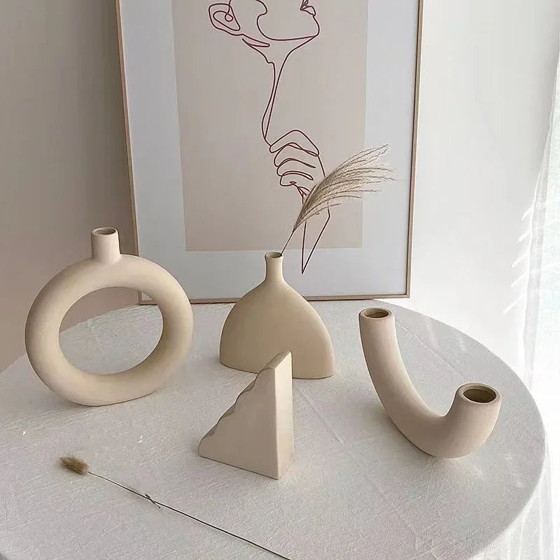 Set of modern abstract ceramic vases in matte beige, minimalist home decor for living room or dining table display
