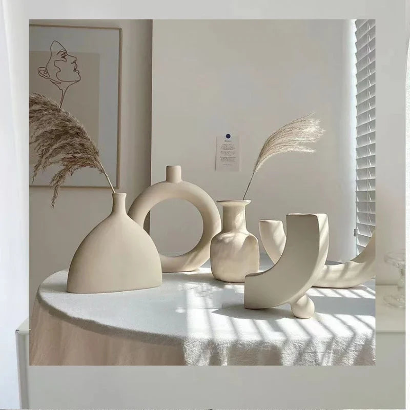 Set of modern abstract ceramic vases in matte beige, minimalist home decor for living room or dining table display