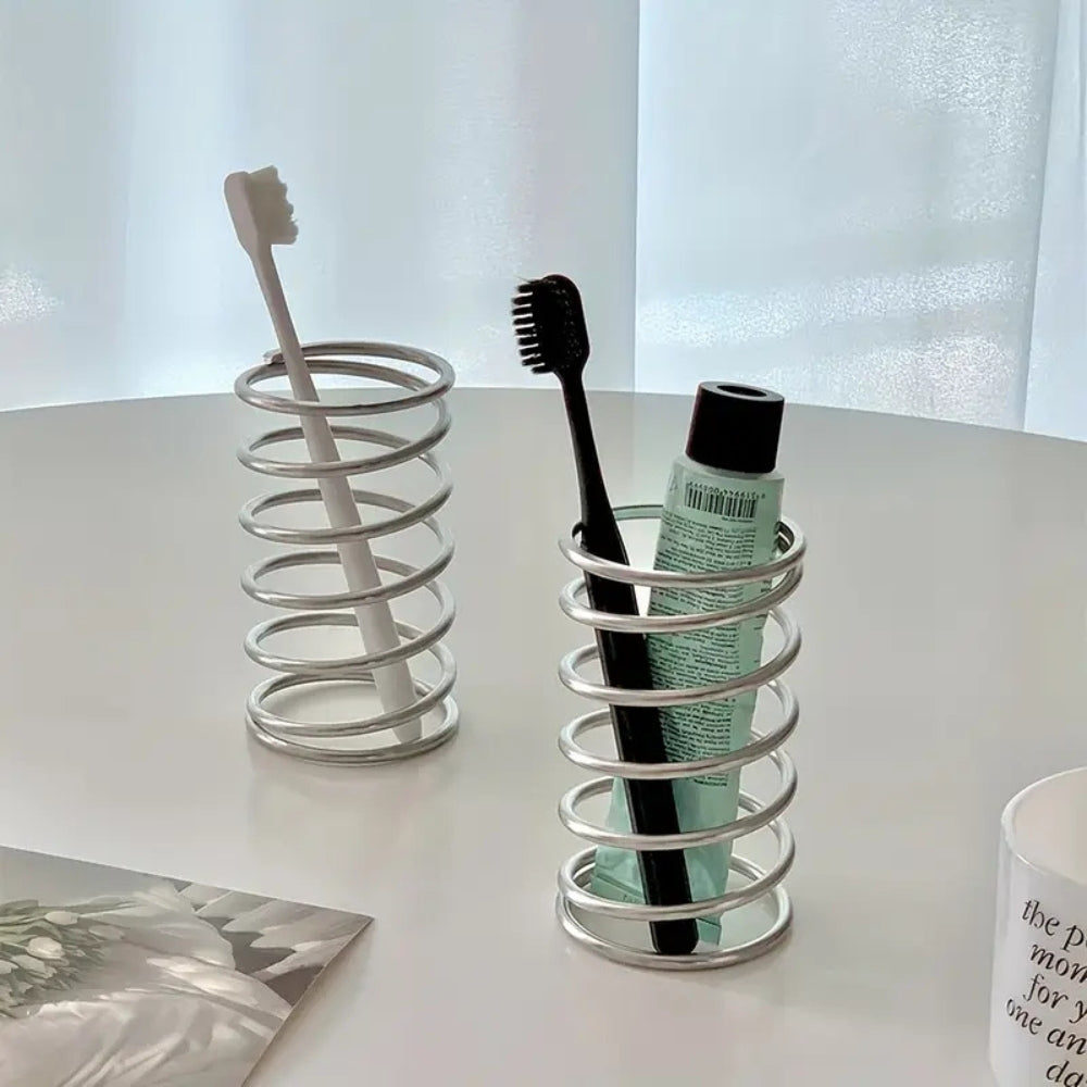 Stainless steel spiral makeup brush holder, modern cosmetic organizer stand for vanity or bathroom storage