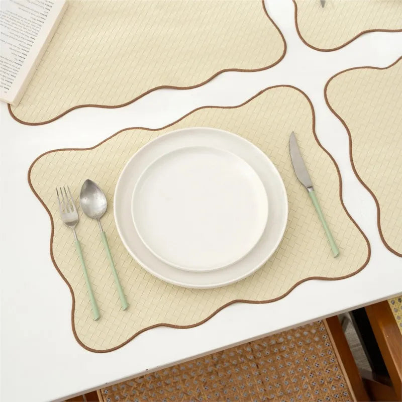 Elegant beige kitchen table mat with wavy brown trim – heat-resistant and non-slip placemat for dining table protection and home decor