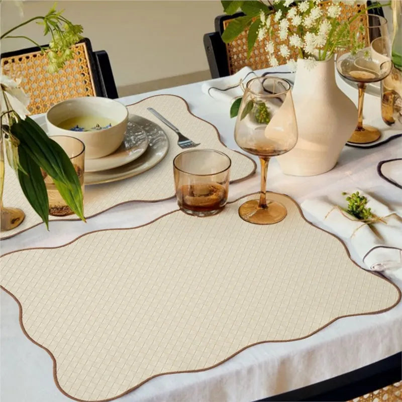 Elegant beige kitchen table mat with wavy brown trim – heat-resistant and non-slip placemat for dining table protection and home decor