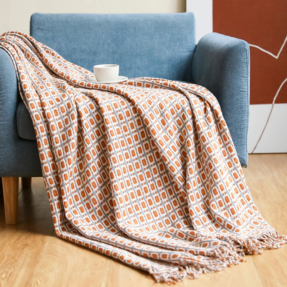 Throw blanket – Knitted fabric  – Cozy sofa accessory with tassels