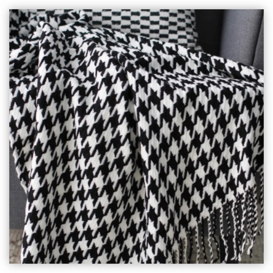 Throw blanket – Knitted fabric  – Cozy sofa accessory with tassels