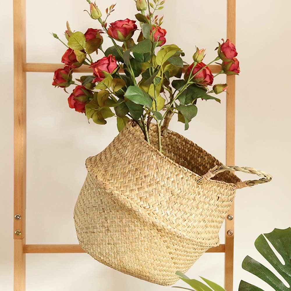 Handwoven seagrass storage baskets with pink and red roses, rustic woven planters for home decoration
