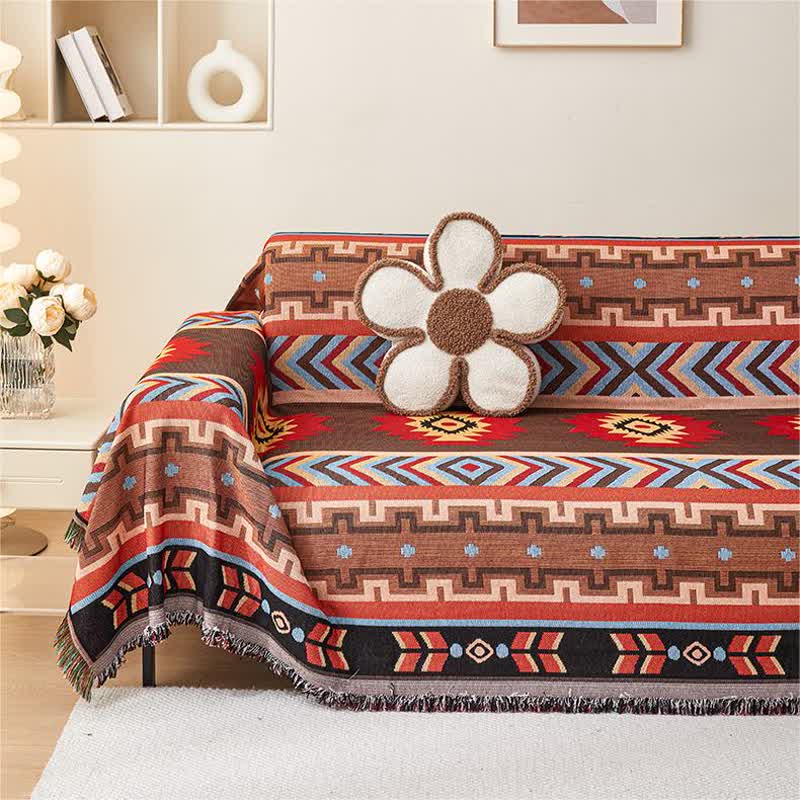 Geometric sofa cover with tassels