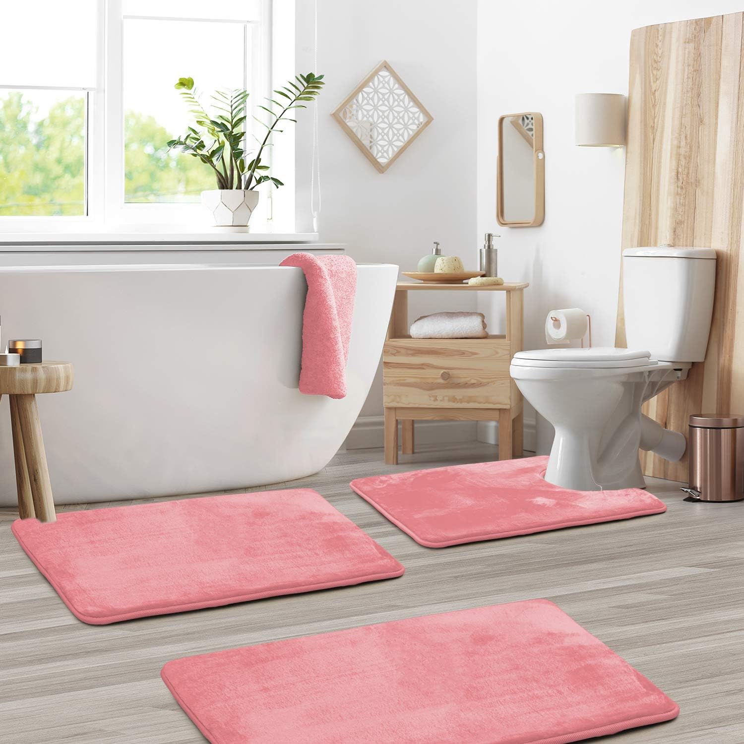 Set of three dark gray memory foam bathroom rugs with non-slip backing, soft absorbent bath mats for toilet, shower, and vanity area