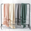 Snug Knit Woven Tassel Blanket