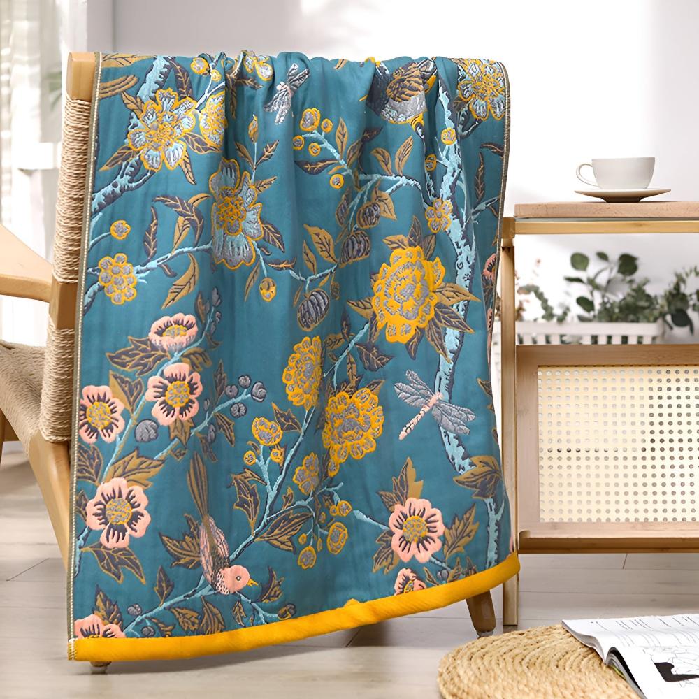 Floral throw blanket with orange background and blue yellow flower design, soft decorative sofa and bed cover