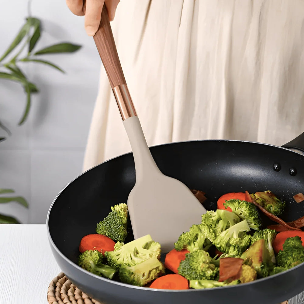10-piece silicone kitchen utensil set with wood grain handles, heat-resistant cooking tools including spatulas, spoons, ladle, and pasta server