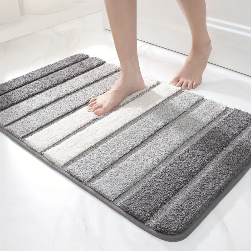 Soft striped gray bath mat with non-slip backing, absorbent plush bathroom rug for shower and tub area