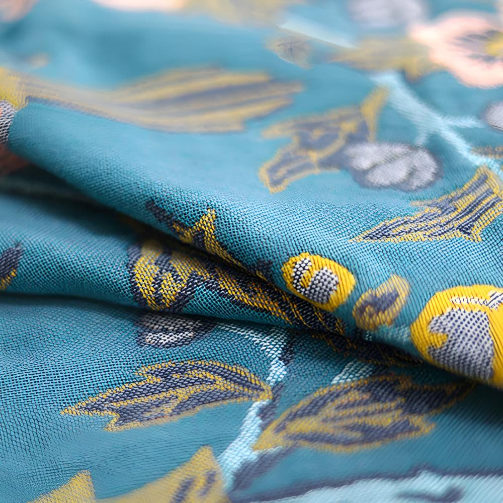 Floral throw blanket with orange background and blue yellow flower design, soft decorative sofa and bed cover