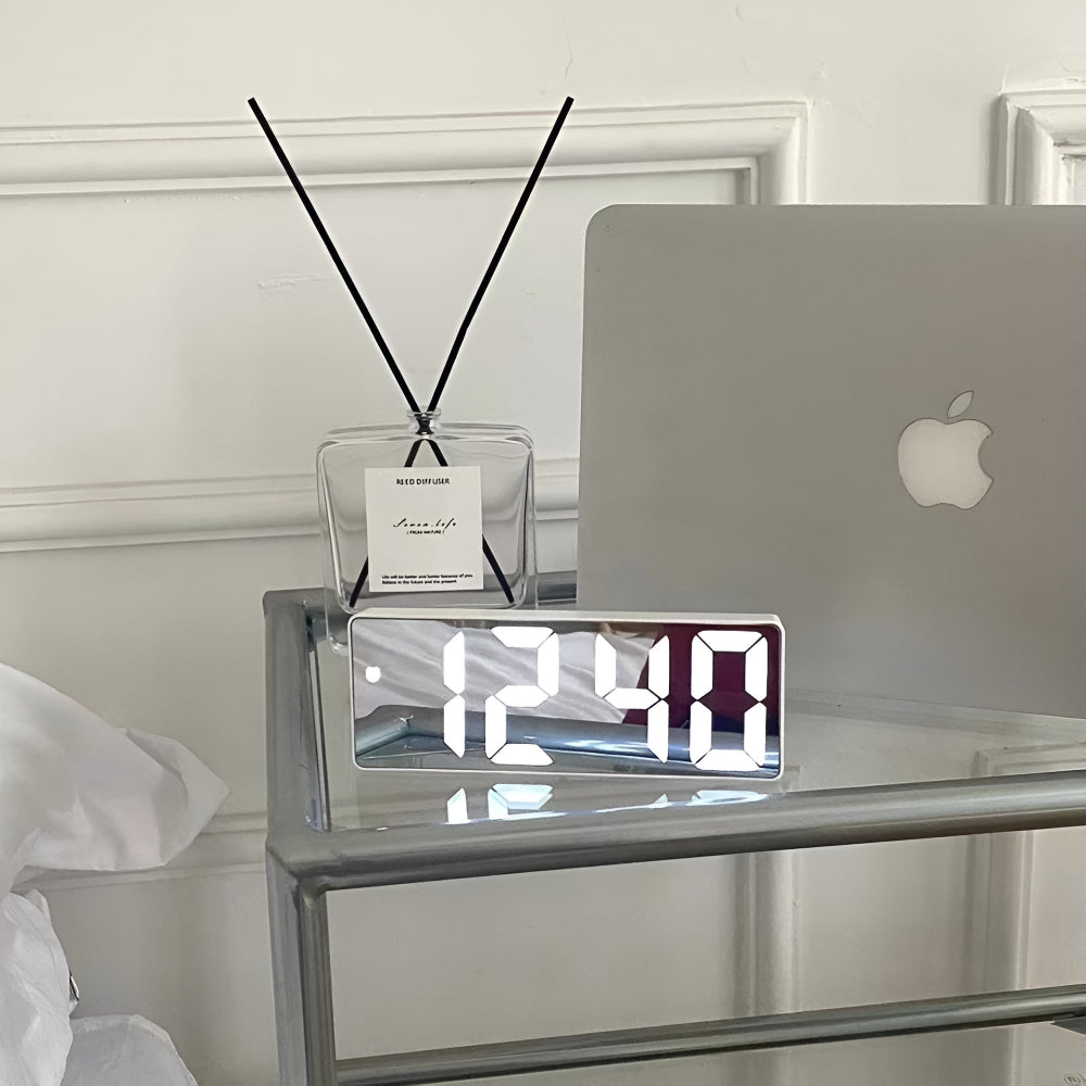 Modern LED digital alarm clock in black and white with large display, 12/24 hour format and night light feature