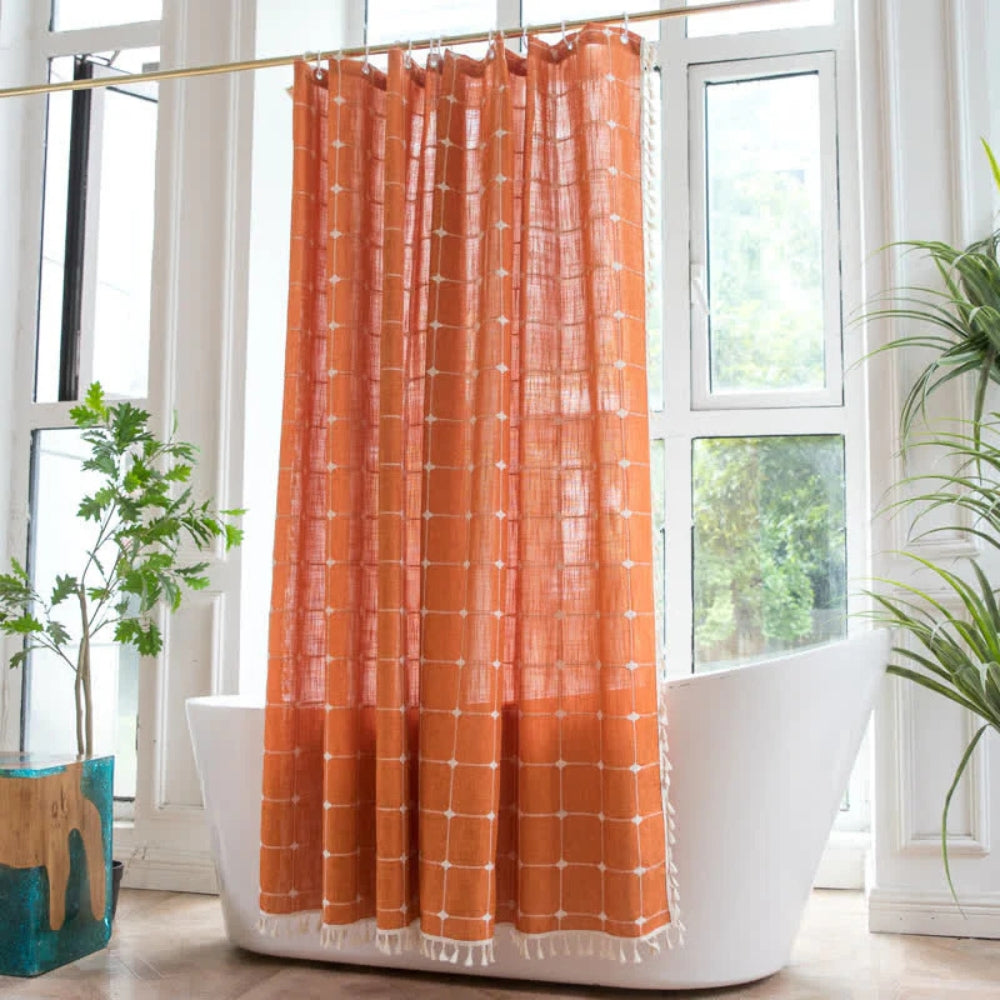 Light green sheer shower curtain with grid pattern and tassel trim, waterproof bathroom curtain for modern home decor