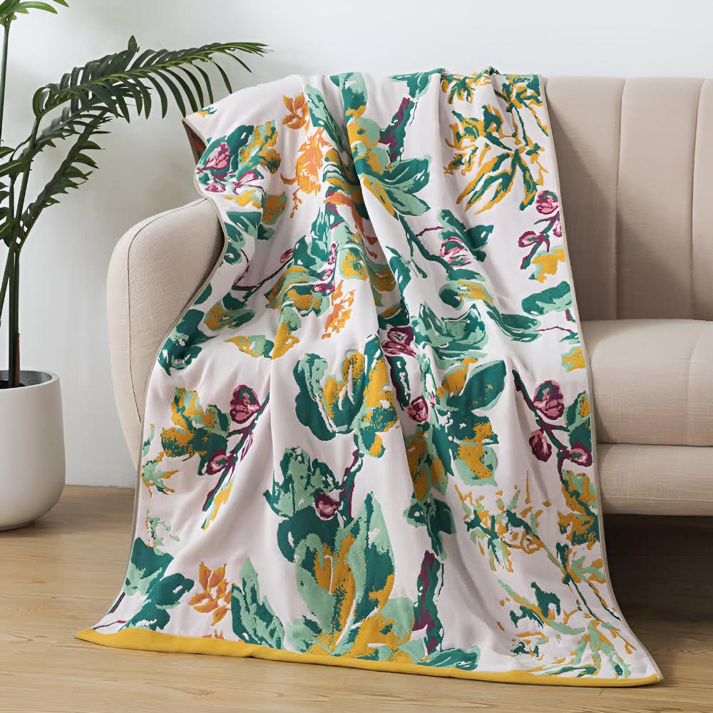 Soft decorative throw blanket with bold yellow and blue floral leaf print, lightweight cozy sofa couch cover