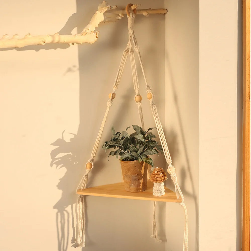 Boho macrame hanging shelf with wooden beads, handmade rope plant holder for wall or window decor