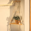 Boho macrame hanging shelf with wooden beads, handmade rope plant holder for wall or window decor