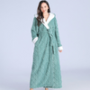 Women's long purple fleece bathrobe with hood, white trim, and textured chevron pattern, cozy winter loungewear