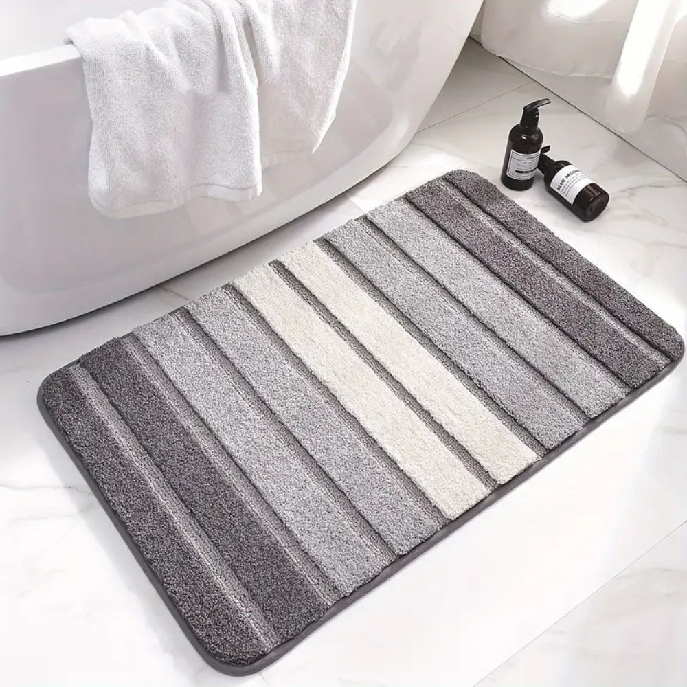 Soft striped gray bath mat with non-slip backing, absorbent plush bathroom rug for shower and tub area