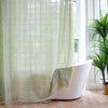 Light green sheer shower curtain with grid pattern and tassel trim, waterproof bathroom curtain for modern home decor