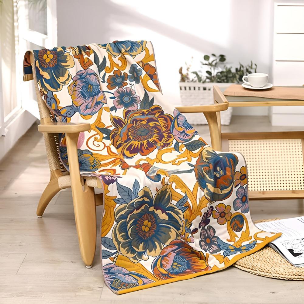 Floral throw blanket with cream background and bold blue yellow flower pattern, soft decorative sofa and bed cover