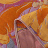 Floral throw blanket with orange and yellow flower pattern on purple background, soft decorative sofa and bed cover