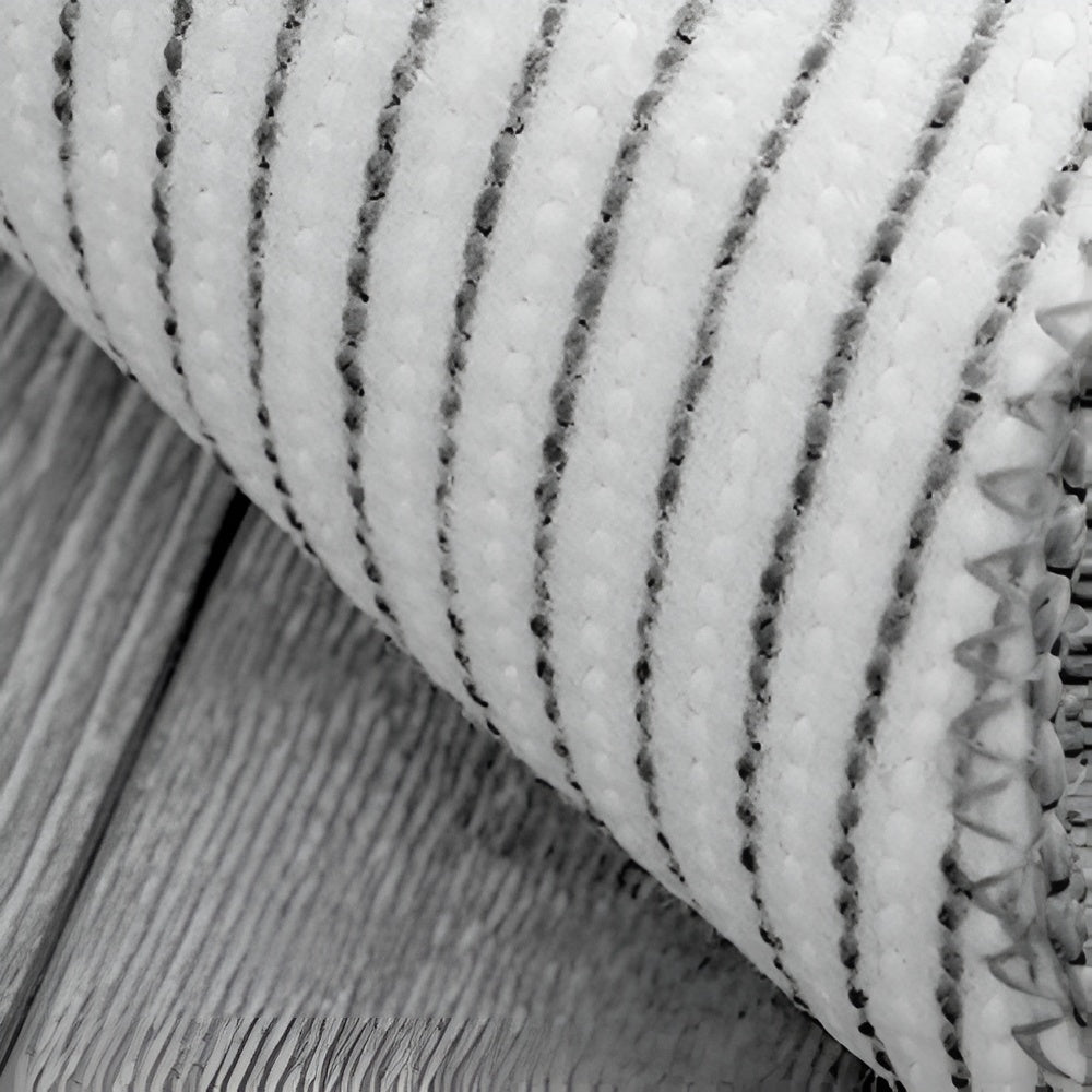 Gray footprint bath mat with soft plush texture, absorbent and non-slip bathroom rug for shower and tub