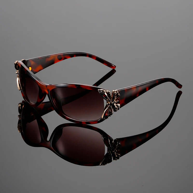 FlutterGlow | Chic sunglasses with butterfly pendants