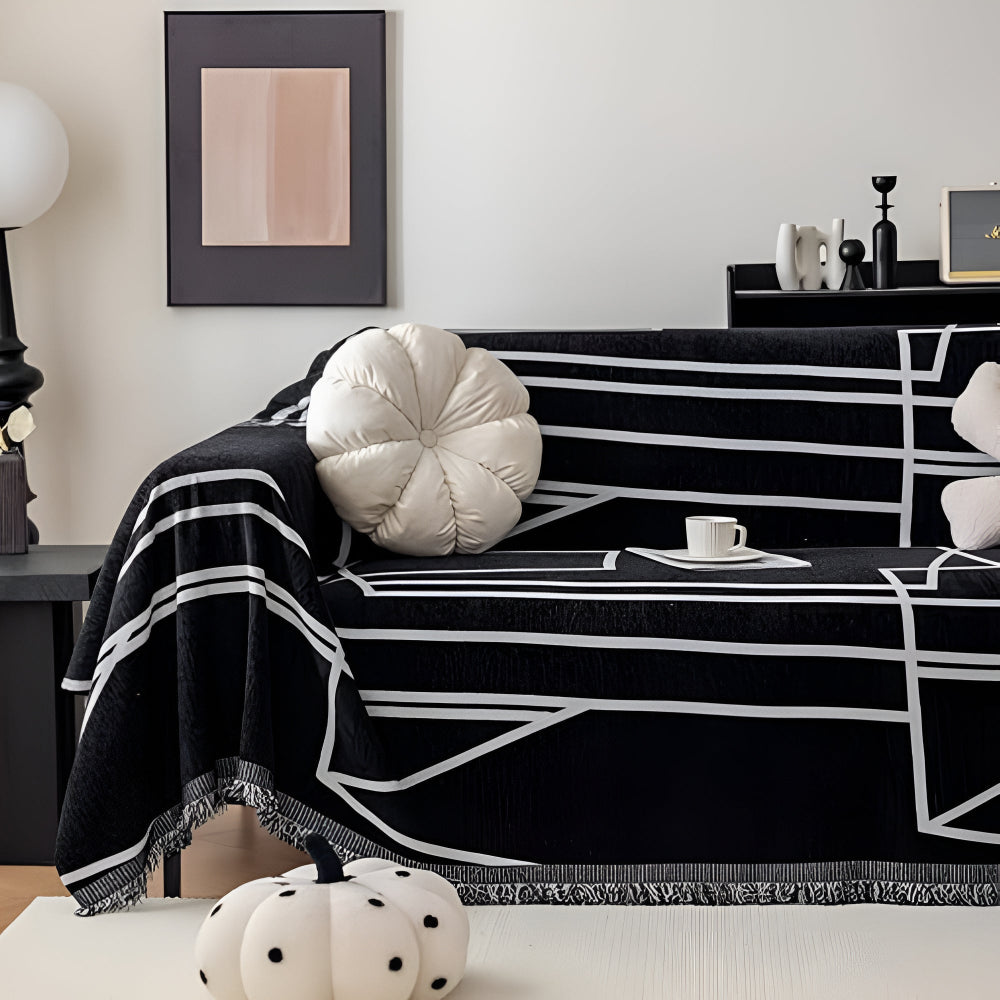 Black geometric sofa cover with white line pattern, modern couch throw for living room protection and home decor