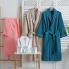 Pink waffle bathrobe with shawl collar, front pockets, and waist belt – lightweight cotton robe for women