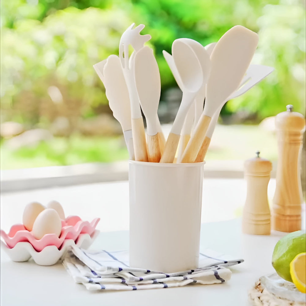 11-piece silicone kitchen utensil set with wooden handles, heat-resistant cooking tools including spatula, whisk, ladle, and tongs