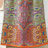 Colorful bohemian mandala throw blanket with intricate geometric and floral patterns in orange, green, pink, and yellow