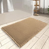 Anti-slip waffle bathroom rug in natural beige with textured weave, absorbent bath mat for shower and bathroom floor