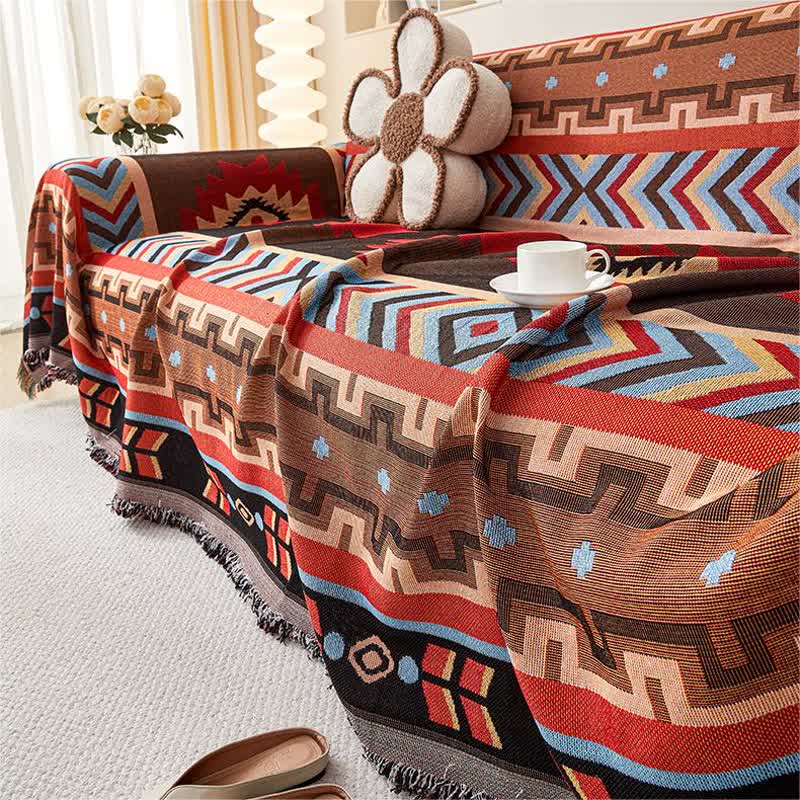 Geometric sofa cover with tassels