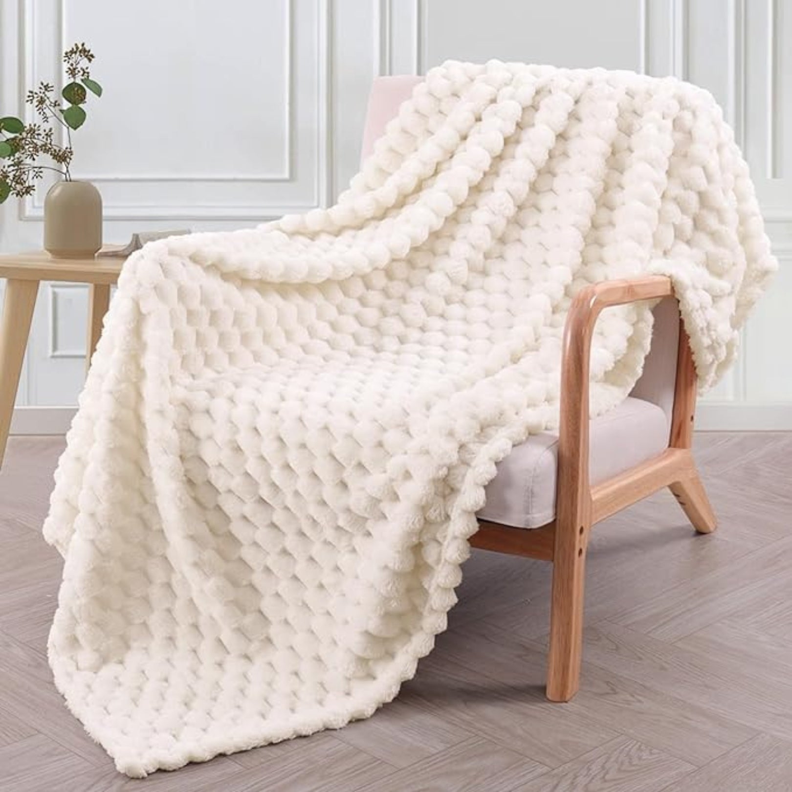Cream plush faux fur throw blanket with bubble texture, soft and cozy couch or bed cover for home decor